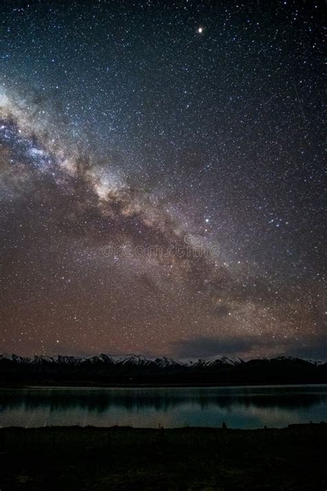 Beautiful Milky Way, Starry Night Over the Snow Mountain at Lake Pukaki, New Zealand Stock Image ...