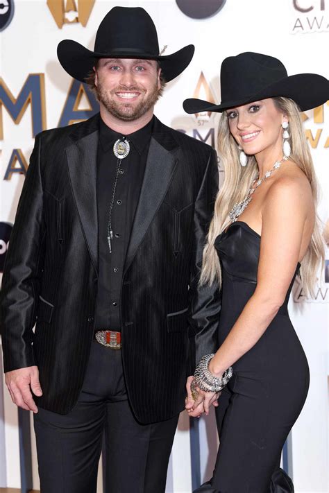 Lainey Wilson and Devlin 'Duck' Hodges Walk Hand-in-Hand on 2023 CMAs ...