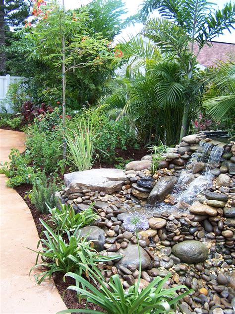 Let us create a serene backyard oasis with a beautiful water feature ...