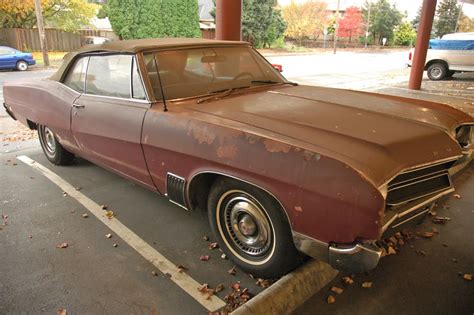 OLD PARKED CARS.: 1967 Buick Wildcat Convertible.