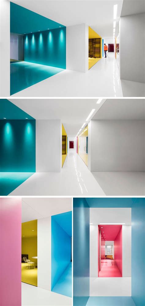 This contemporary and open-concept office design is mostly white, however bold pops of… | Modern ...