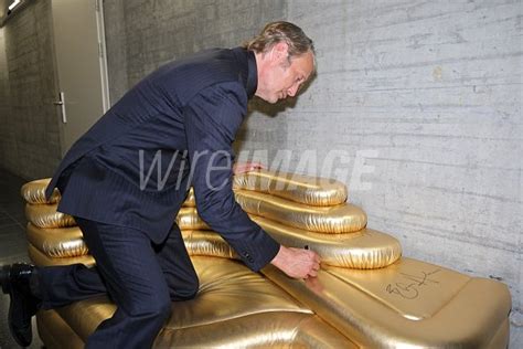 Mads Mikkelsen signs a golden couch as he attends the ZFF Masters Mads ...