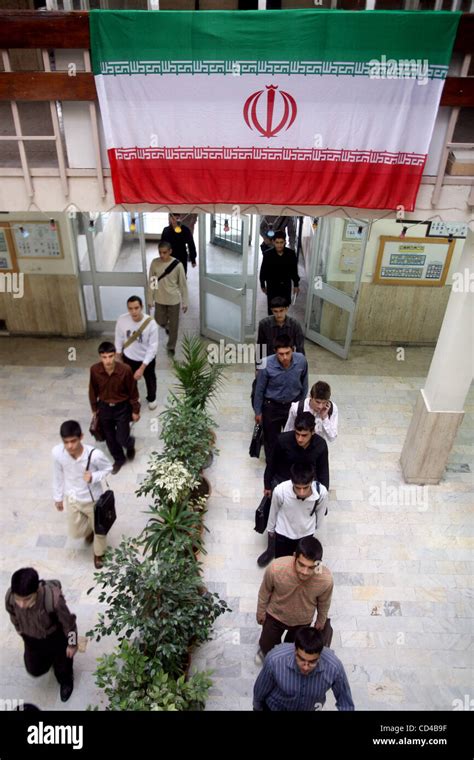 2008/09/23: Iranian high school students enter to school building under ...