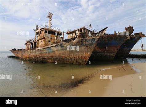 Ship wrecks rusting on the beach of Nouadhibou, one of the largest ship ...