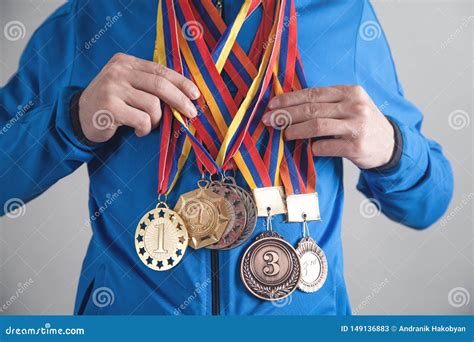 Sportsman with Medals. Sport, Winner, Success Stock Image - Image of sportswear, metal: 149136883