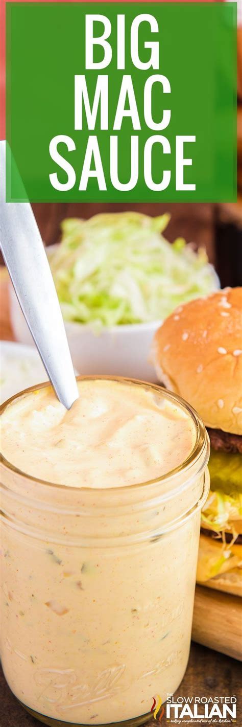 a big mac sauce in a jar next to a hamburger