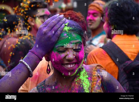 Kolkata, India. 15th Mar, 2016. Student enjoys playing abir ...