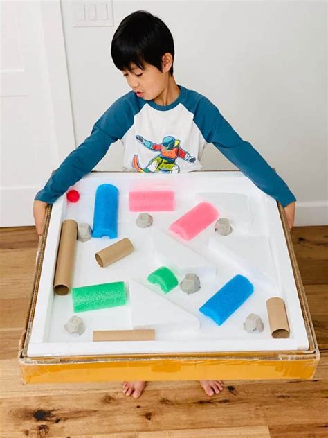 Giant Cardboard Ball Maze - Fun recycled STEM project for kids