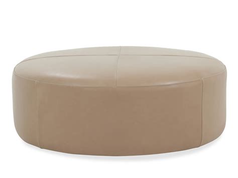 Casual 42" Leather Round Ottoman in Brown | Mathis Brothers Furniture