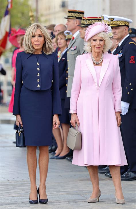 Brigitte Macron Dons Nautical Suit to Meet Queen Camilla in Pink Dress