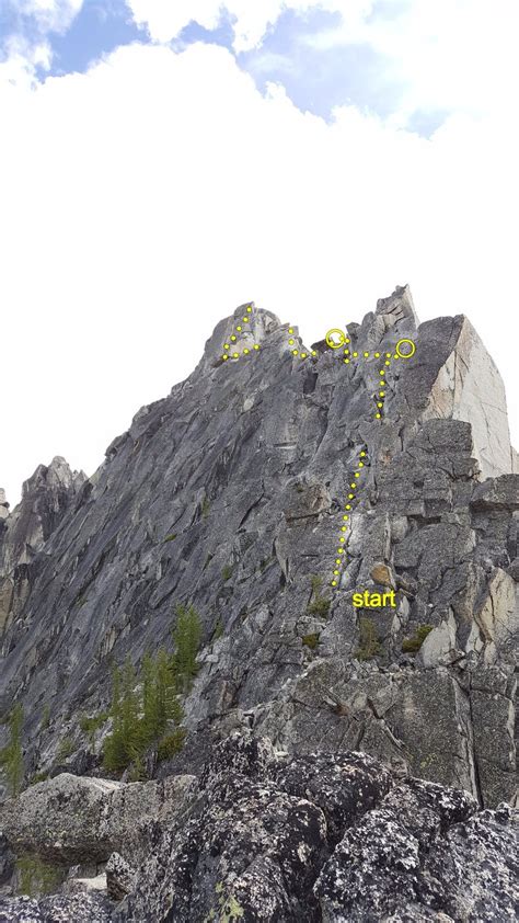 Prusik Peak west ridge from just N of Prusik Pass. The climb begins in the obvious lighter ...