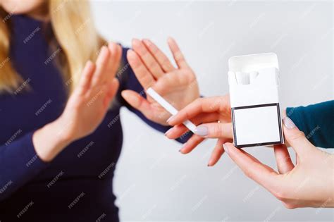 Premium Photo | Closeup of woman giving up smoking cigarettes