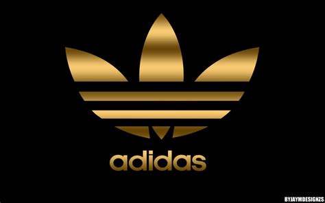 the adidas logo in gold on a black background