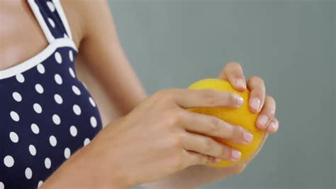 Woman peeling orange, Stock Footage | VideoHive