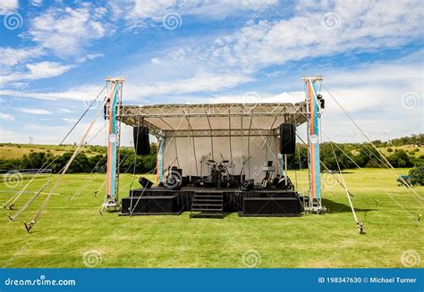 Small Outdoor Concert Venue Stage and Lighting in a Empty Field ...