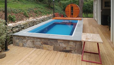 Original Endless Pool with adjacent sauna | Endless pool, Pool decks, Endless swimming pool