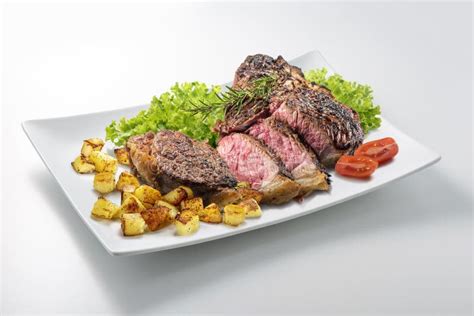 Fiorentina T-bone Steak Cut on Rectangular White Plate Stock Image ...