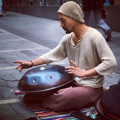 A Street Musician Playing the Hang Drum - Hong Kong Thru My Eyes