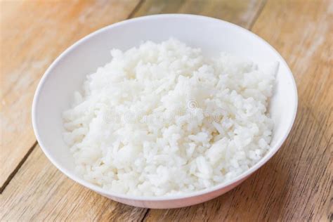 Cooked rice in white cup stock photo. Image of carbohydrate - 62444292