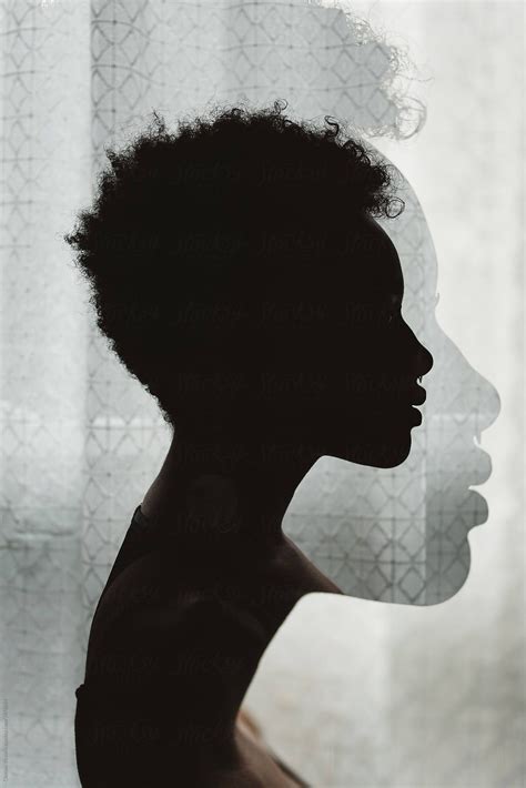 A young African American woman in silhouette by Chelsea Victoria for ...