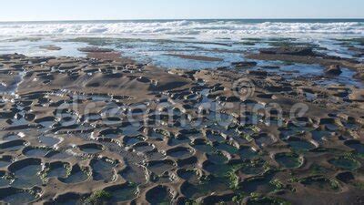 Eroded Tide Pool Rock Formation in California. Littoral Intertidal Tidepool Zone Stock Footage ...