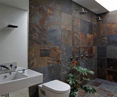 Slate tiles give this Cambridge bathroom a rustic connection to nature