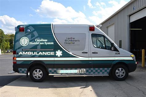 an ambulance parked in front of a building