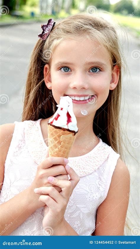 Cute Happy Smiling Little Girl Child Eating an Ice Cream Outdoor Stock Photo - Image of person ...