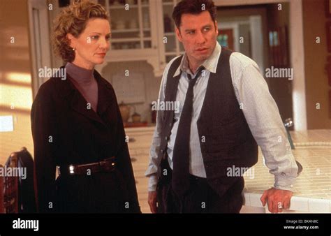 FACE/OFF (1997) FACE OFF (ALT) JOAN ALLEN, JOHN TRAVOLTA FAOF 020 Stock Photo - Alamy