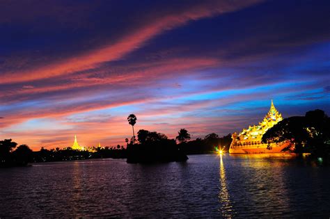 Lovely night view of Yangon with Shwedagon Pagoda and Karaweik. For ...