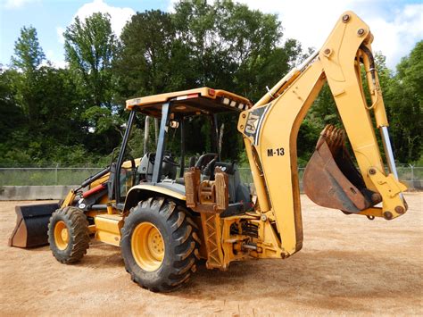 CATERPILLAR 420D IT Backhoe - J.M. Wood Auction Company, Inc.