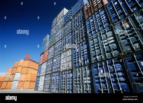 Shipping container in storage yard Stock Photo - Alamy