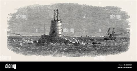 WOLF ROCK LIGHTHOUSE 1867 Stock Photo - Alamy