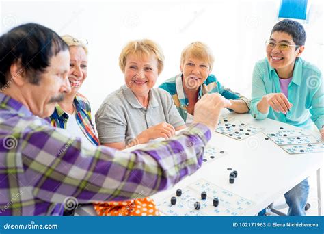 Seniors playing bingo stock image. Image of nursing - 102171963