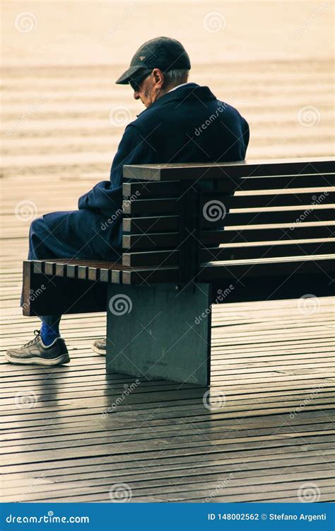 Old Man Sitting Alone on a Bench Editorial Photography - Image of casual, lonely: 148002562