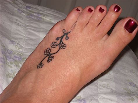 CR Tattoos Design: Small foot tattoos for women