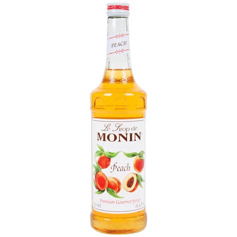 Monin 750 mL Premium Peach Flavoring / Fruit Syrup