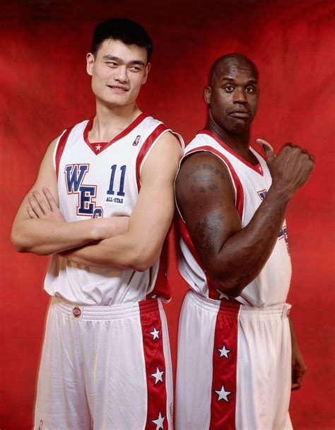 The two "centers of the universe" meet again, as @shaq & @yaoming ...