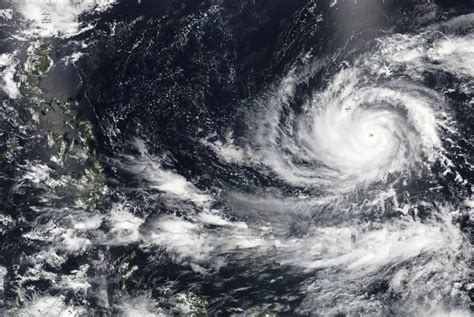 Typhoon Mawar closes in on Guam as residents shelter, military sends away ships | The Manila Times