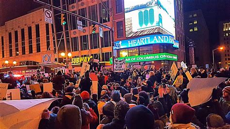 Protesters march in downtown Columbus in response to Trump's recent executive orders | The Chimes