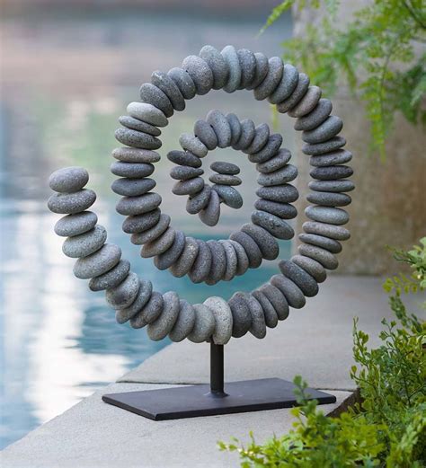 This Stone Spiral sculpture makes a wonderful statement piece for the home that appreciates the ...