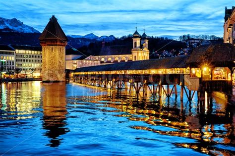 Lucerne, Switzerland, the Old town and Chapel bridge in the late evening blue light ...