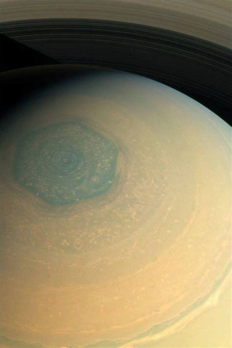 The sides of Saturn's hexagonal North pole are about 13,800 km (8,600 mi) long, which is more ...