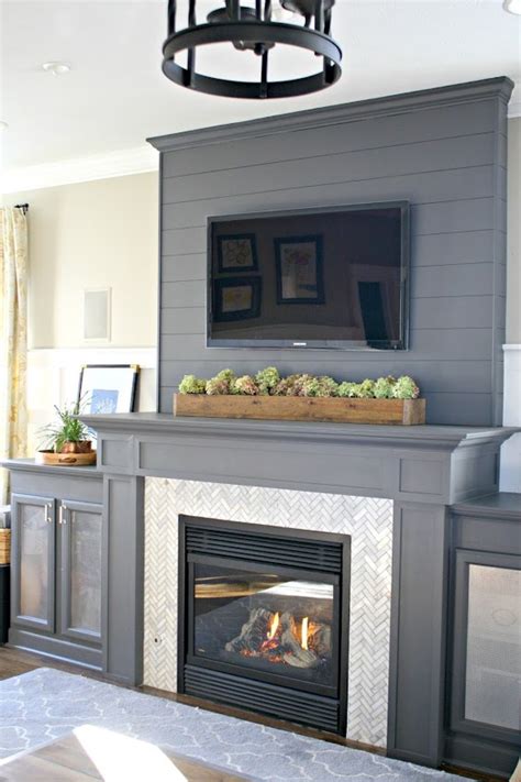 How to install stacked stone tile on a fireplace wall from Thrifty Decor Chick