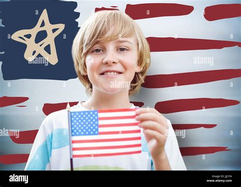 Boy holding american flag against hand drawn american flag and blurry blue background Stock ...