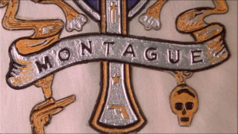 an iron cross with the words montague on it and skull decorations around it