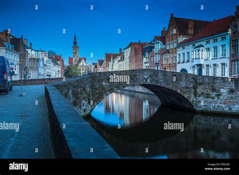 Beautiful panoramic view of famous Spiegelrei canal with famous Poortersloge and Jan van Eyck ...