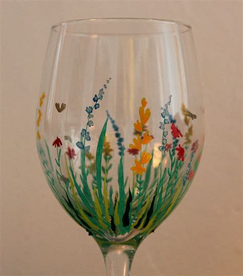 Field of Flowers Hand Painted Wine Glass. $20.00, via Etsy. | Wine glass crafts, Hand painted ...