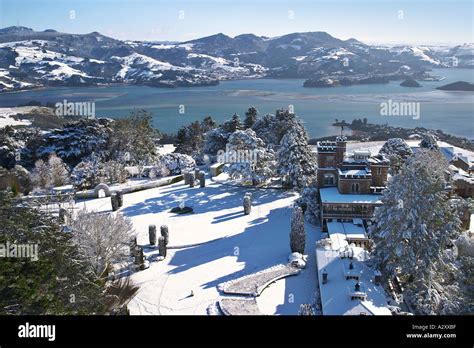 Larnach Castle and snow Otago Peninsula Dunedin South Island New Zealand aerial Stock Photo - Alamy