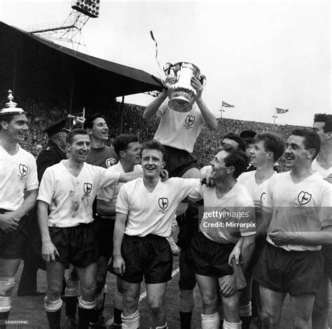 Tottenham Hotspur celebrate with the FA cup trophy after their win ...